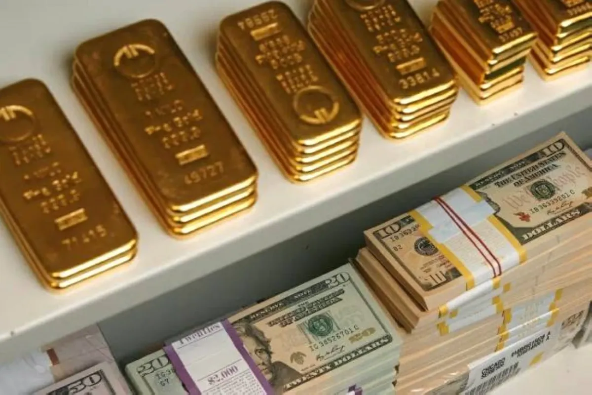 تراجع الذهب 100 دولار بعد رفع الفائدة الأمريكي